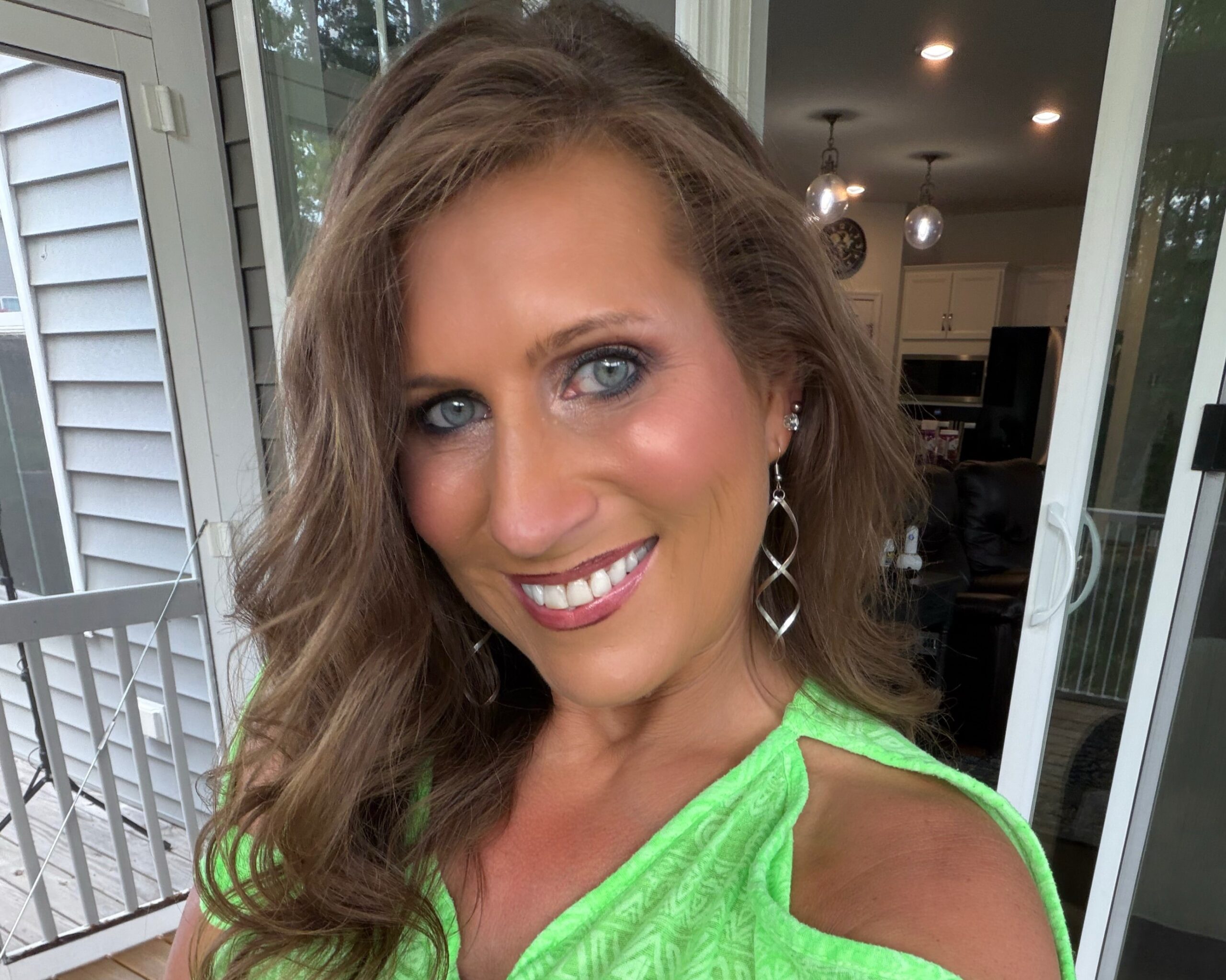 Eve wearing a green dress