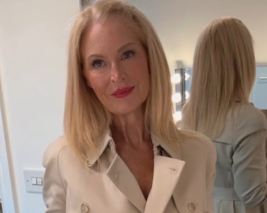 Helie Jane wearing a trench coat