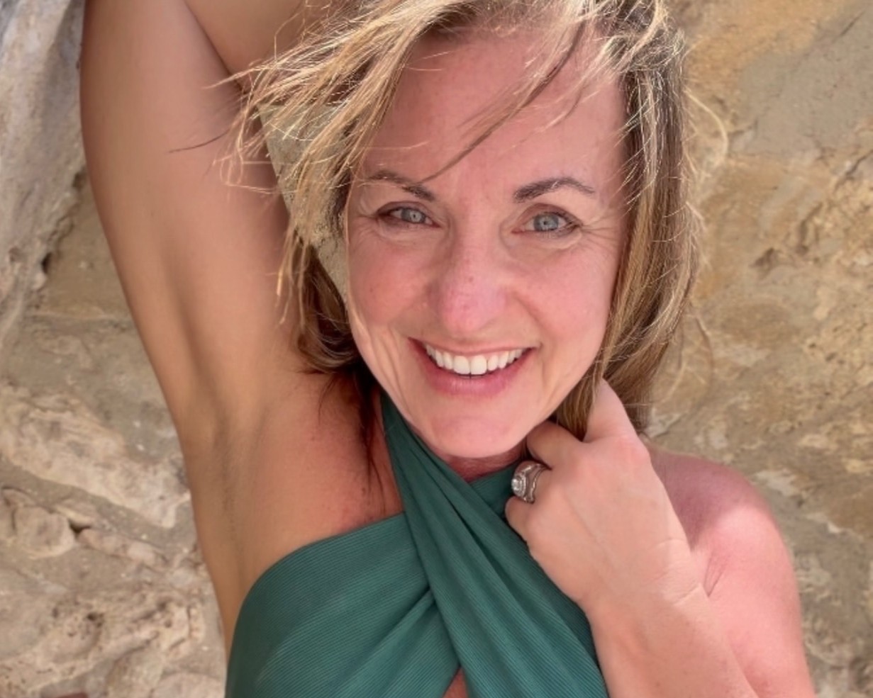 Robin Lynn in a green bikini